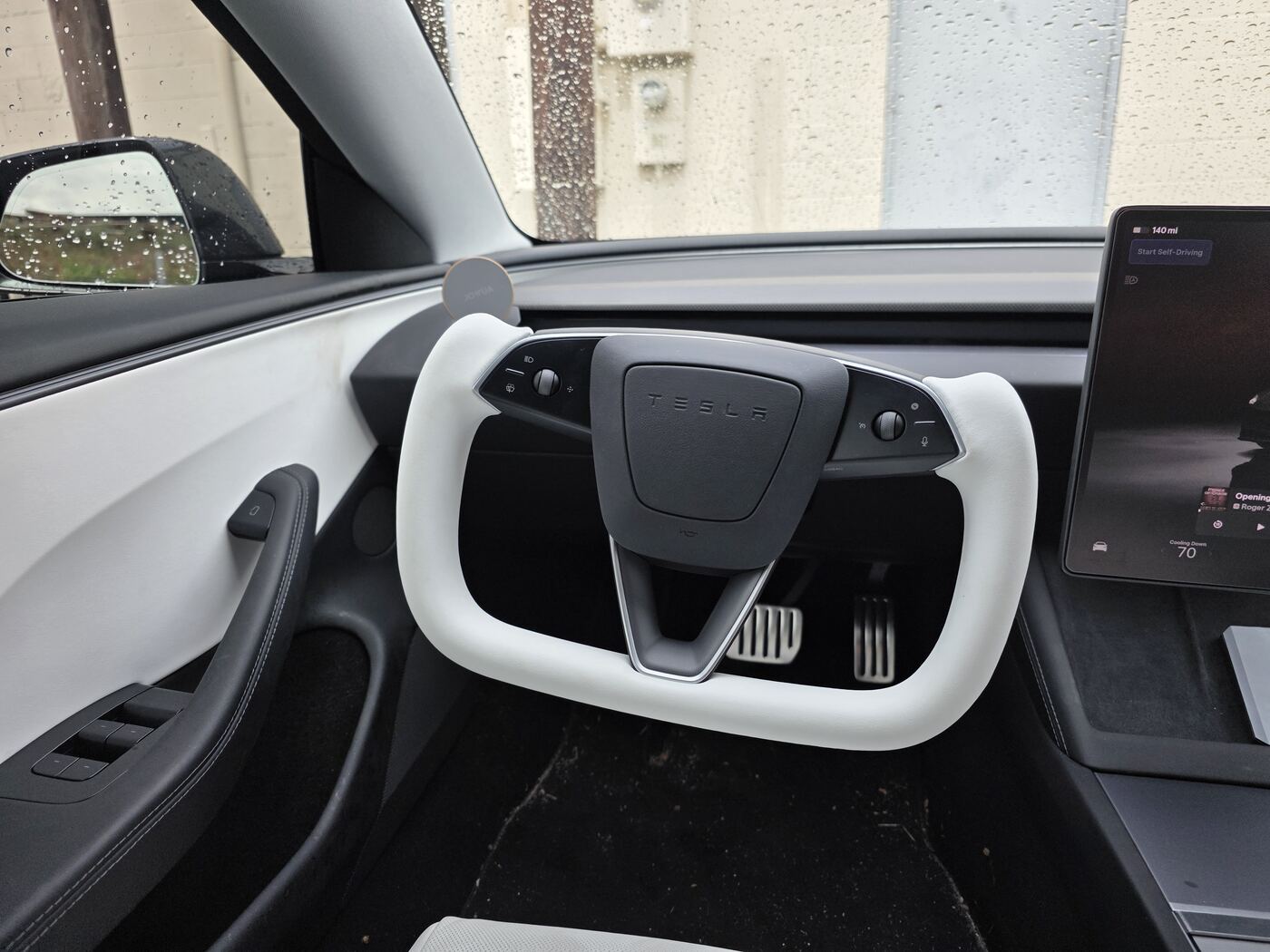 Recent job: original and replacement steering wheels side by side